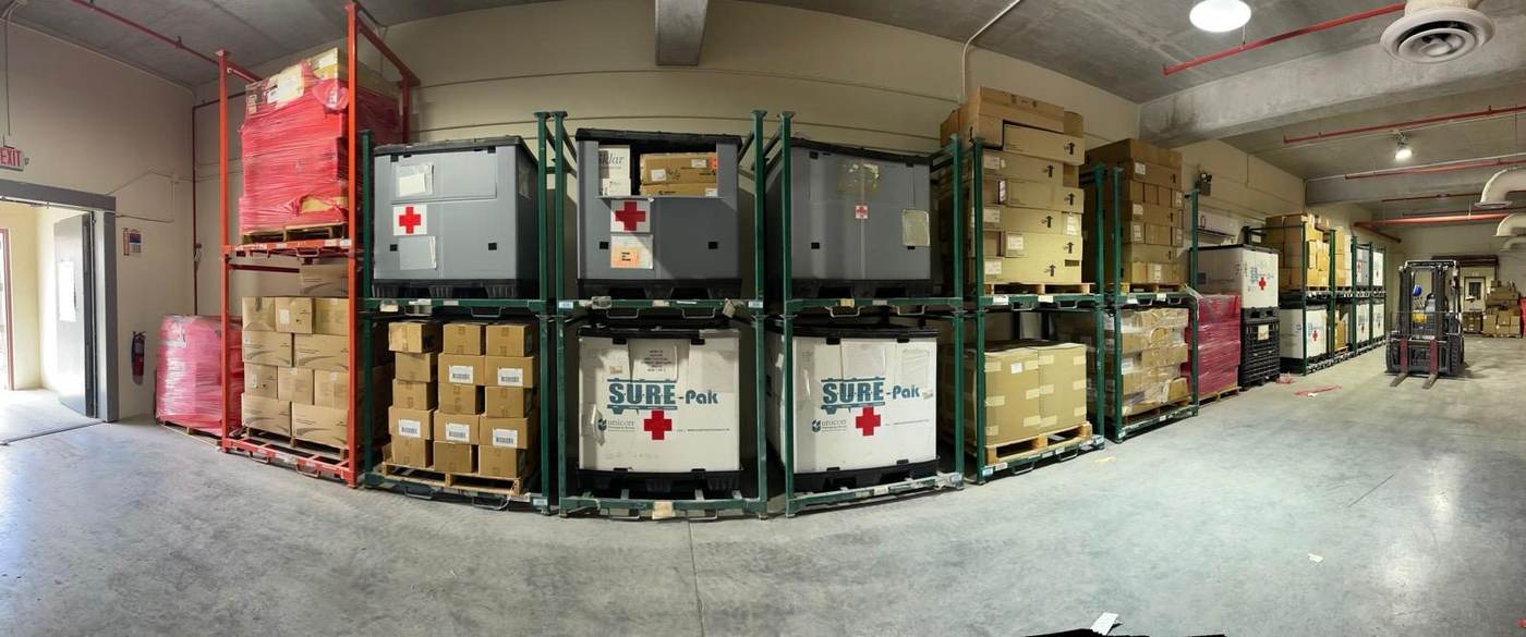 Medical logistics supplies stored in warehouse racks